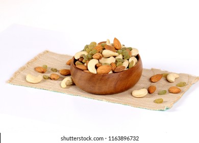 Assorted Nuts On White, Dry Fruits, Mix Nuts, Almond, Cashew, Raisins