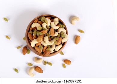 Assorted Nuts On White, Dry Fruits, Mix Nuts, Almond, Cashew, Raisins