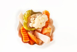 Assorted Pickles Vegetables In White Bowl. Top View. Isolated.