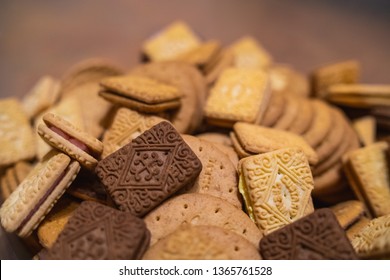 assorted platter mountain of mixed biscuits, digestive custard cream bourbon pink filling chocolate - Shutterstock ID 1365761528