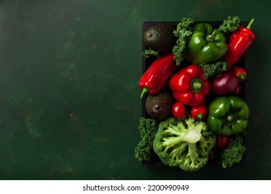 assorted red and green vegetables tomatoes, bell peppers, kale avocado - Shutterstock ID 2200990949