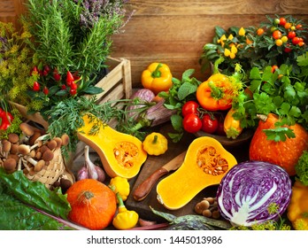 Assorted seasonal vegetables and fresh herbs on a rustic wooden table. - Powered by Shutterstock