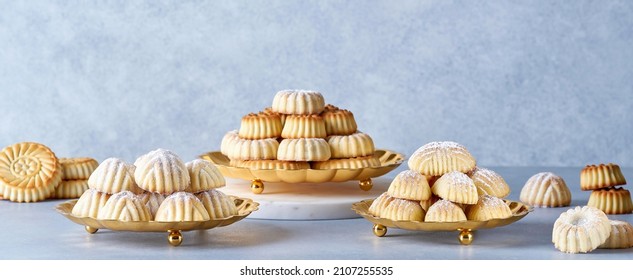 Assorted semolina maamoul or mamoul cookies with dates , walnuts and pistachio nuts. Traditional arabic Eid al Adha, Eid al Fitr sweets  . Banner                            - Shutterstock ID 2107255535