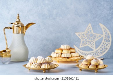   Assorted semolina maamoul or mamoul cookies with dallah and ramadan decor. Traditional arabic Eid al Adha, Eid al Fitr sweets                               - Shutterstock ID 2131861411