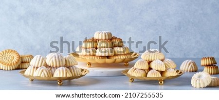 Assorted semolina maamoul or mamoul cookies with dates , walnuts and pistachio nuts. Traditional arabic Eid al Adha, Eid al Fitr sweets  . Banner                           