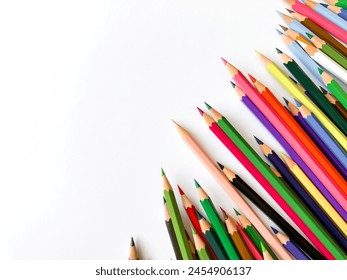 Assorted sharpened colorful pencils pointing up on white background with copy space for text. Concept of artistic or school supplies for design, teaching and educational purposes. - Powered by Shutterstock