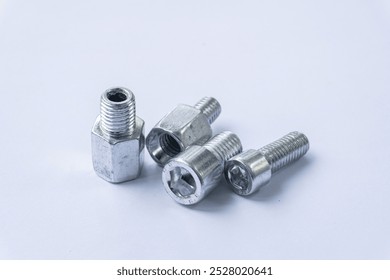 Assorted Silver Hex Socket Cap Screws on White Background