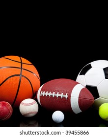 Assorted Sports Balls Including A Basketball, American Football, Soccer Ball, Tennis Ball, Baseball, Golf Ball And Cricket Ball On A Black Background