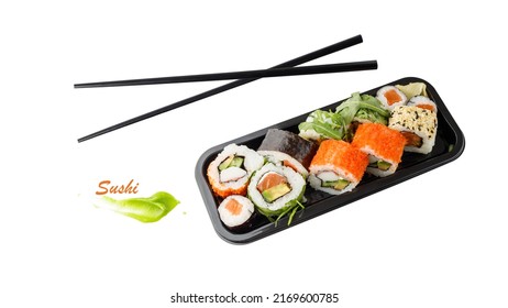  Assorted sushi set in box tray with black bamboo chopsticks isolated on white background. Takeout packaging for supermarket or sushi bar.