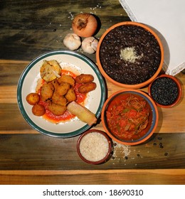 Assorted Typical Cuban Dishes Over Wooded Table