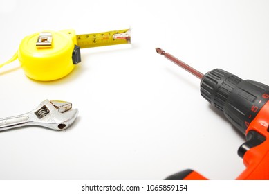 Assorted work and home tools. Isolated white background and copy space