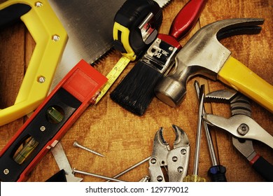 Assorted work tools on wood - Powered by Shutterstock