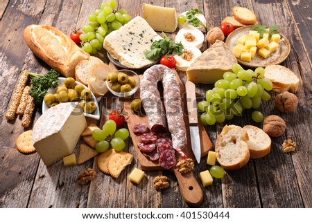 Similar – Assortment of cheeses and wine on wooden table