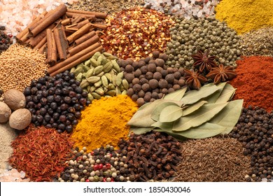 Assortment of aromatic spices and herbs background  - Powered by Shutterstock