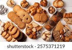 Assortment of baked goods displayed on a wooden surface with various styles and flavors