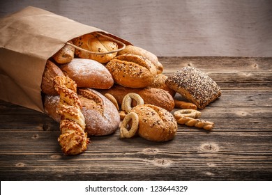 Assortment of baked goods on old wooden table - Powered by Shutterstock