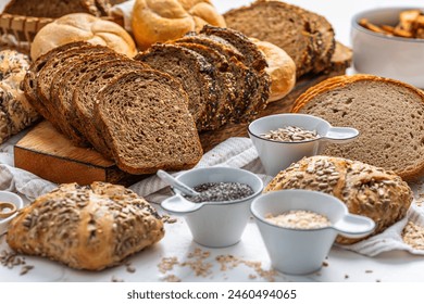 Assortment of bread, rolls and bakery products with salt and seeds - Powered by Shutterstock