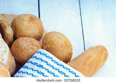 Assortment of bread and tablecloth