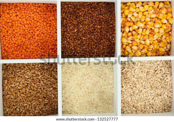 Assortment of
cereals in white wooden box close
up