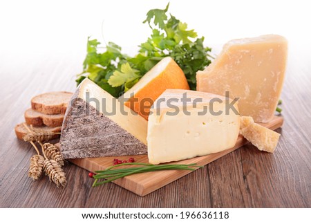 Similar – Assortment of cheeses and wine on wooden table