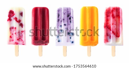 Assortment of cold summer fruit popsicles isolated on a white background