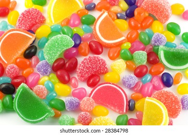 An assortment of colorful candy on full frame background with jellybeans, gumdrops and other jelly candies - Powered by Shutterstock