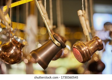 Assortment of copper cezve for making Turkish coffee.
