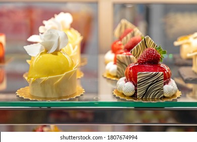 Assortment Of Culinary Art Cakes In Patisserie Display