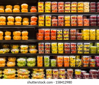 Assortment Of Cut Fruit In Containers On Display For Sale