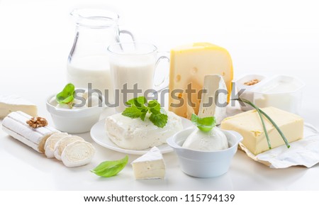 Assortment of dairy products on white background
