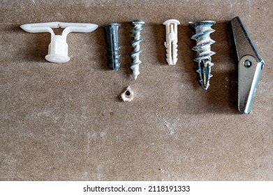 Assortment Of Different Drywall Anchors Used For Hanging Objects On Walls