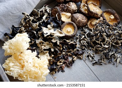 Assortment of dried mushrooms. Different species of Asian dry fungi.
