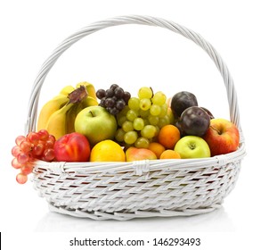 Assortment Of Exotic Fruits In Basket Isolated On White