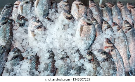 Assortment Of Fish On Ice, Displayed On A Fishmonger Stall In The UK