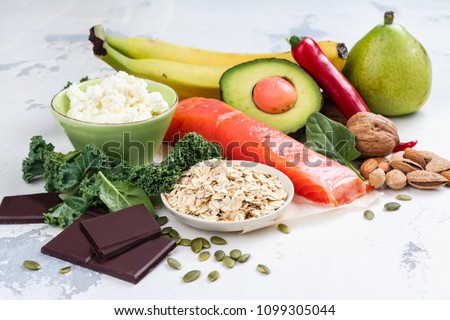 Assortment of food - natural sources of dopamine. Food good for brain on white background. Copy space