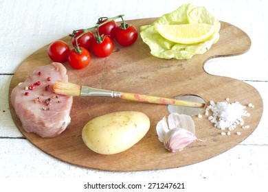 Assortment Of Food On Paint Palette Culinary Idea