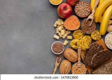 Assortment of food rich on fiber and carbohydrates on gray background with copy space - Shutterstock ID 1470813800