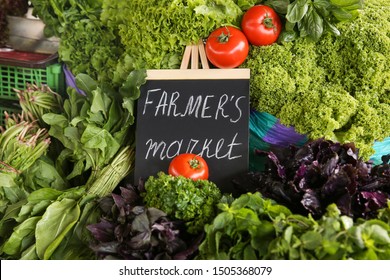 Assortment Of Fresh Herbs On Counter At Farmer's Market