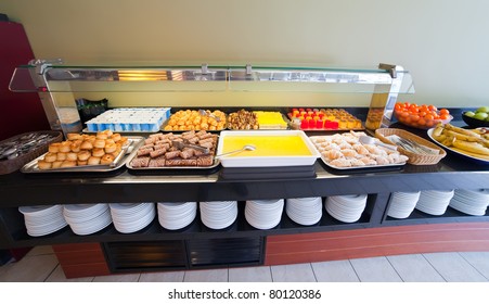 assortment of fresh pastry on table in buffet