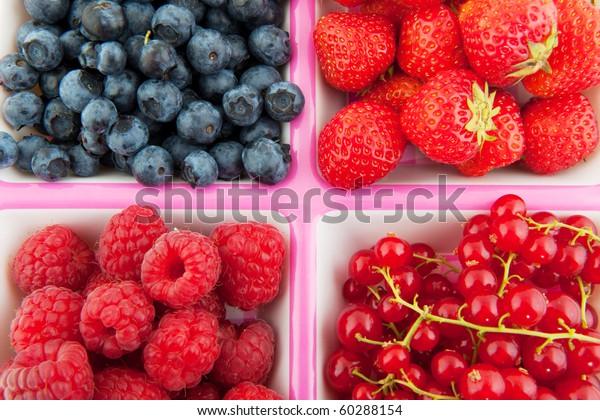 assortment fresh soft\
fruit in divided\
bowl