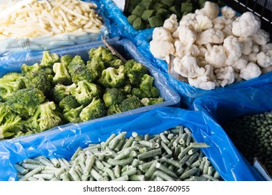 Assortment Of Frozen Vegetables In A Supermarket Fridge