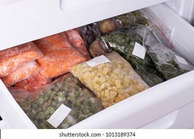 Assortment Of FrozenVegetables In Home Fridge. Frozen Food In The Freezer