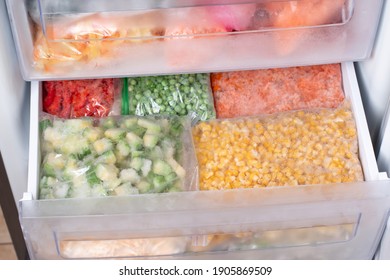 Assortment Of FrozenVegetables In Home Fridge. Frozen Food In The Freezer