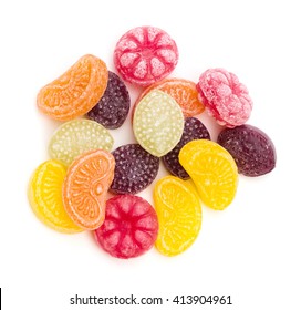 An Assortment Of Fruit Flavored Hard Candy On A White Background