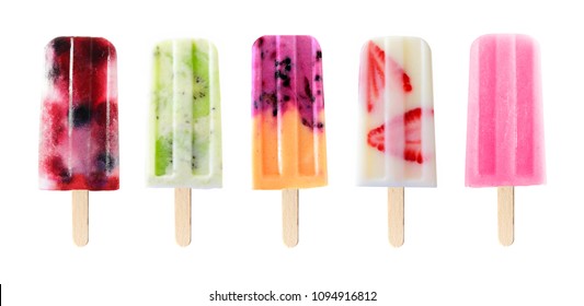Assortment of fruit popsicles isolated on a white background