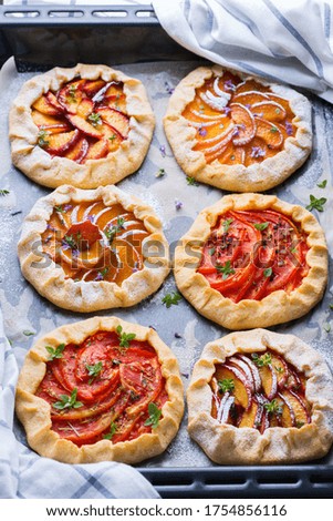 Similar – Puff pastry biscuits with nectarines, camembert and thyme