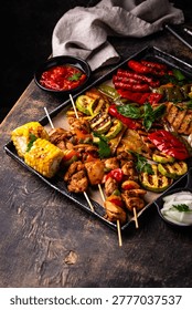 Assortment of grilled bbq meat and vegetables