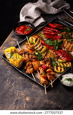 Assortment of grilled bbq meat and vegetables