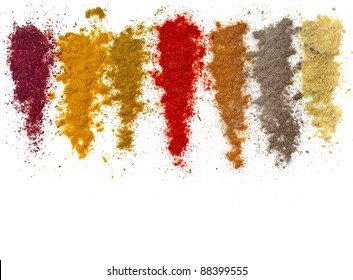 Assortment of ground powder spices isolated  on a white background