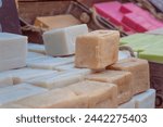 Assortment of handmade soaps from Marseille on market in Aix-en-Provence, 